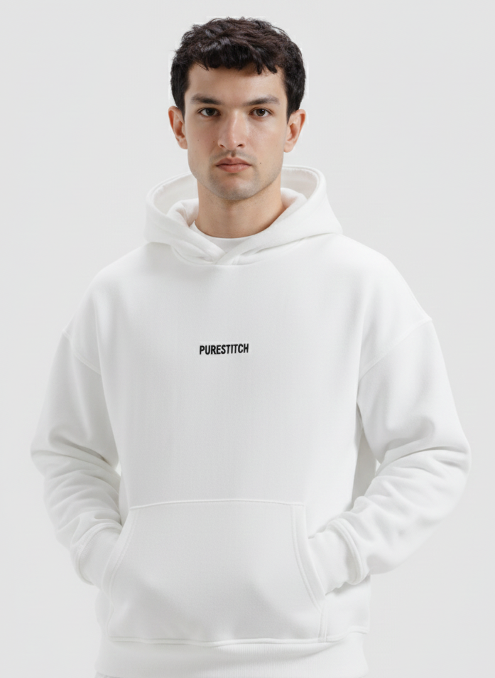 Man wearing a white hoodie with text on a light gray background