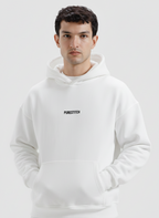 Man wearing a white hoodie with text on a light gray background