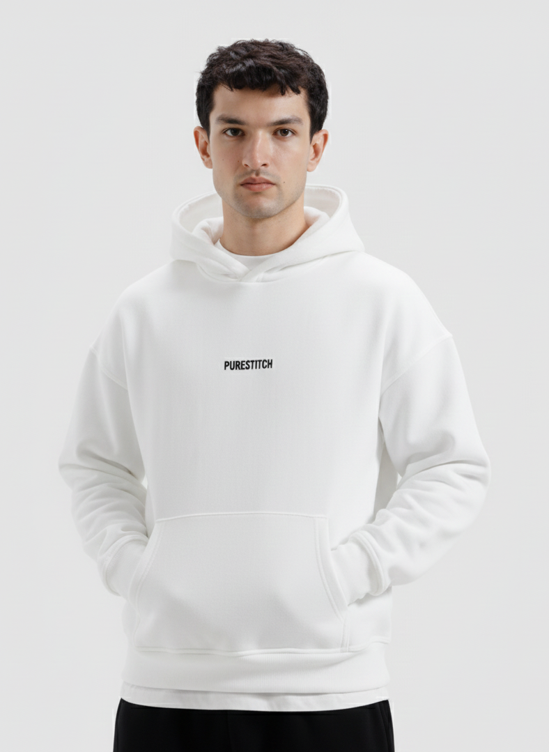 Man wearing a white hoodie with text on a light gray background